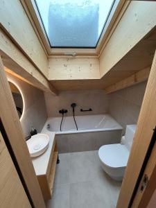 Koupelna v ubytování Charmant duplex à 3min des remontées mécaniques