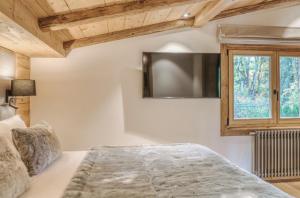 Кровать или кровати в номере Chalet Alps Rosiere Courchevel +23 фотографии