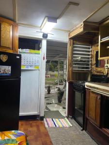 Kuchyň nebo kuchyňský kout v ubytování Home style Cabin