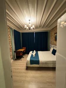 En eller flere senge i et værelse på Veva Flats