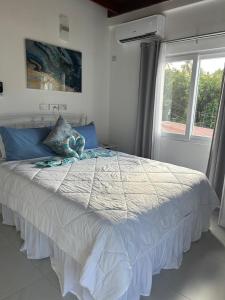 Кровать или кровати в номере Agape Suites-Room 5-2nd Floor