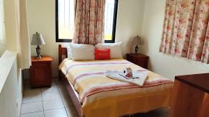 Ένα ή περισσότερα κρεβάτια σε δωμάτιο στο Celeste Vida