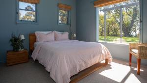 En eller flere senge i et værelse på Horizon Haven 10 + 17 billeder