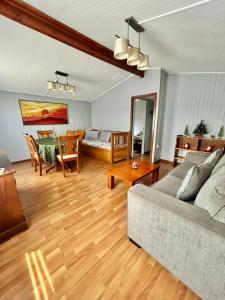 Un lugar para sentarse en Amplia Casa Totalmente Equipada