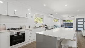 Η κουζίνα ή μικρή κουζίνα στο 52A Chalmers Street Flynns Beach