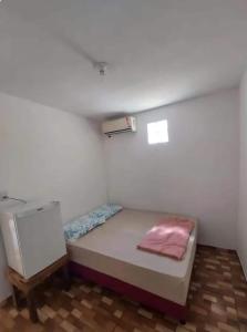 Postel nebo postele na pokoji v ubytování Suites e Quartos Atalaia Salinas PA