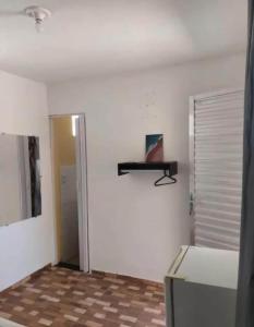 TV a/nebo společenská místnost v ubytování Suites e Quartos Atalaia Salinas PA