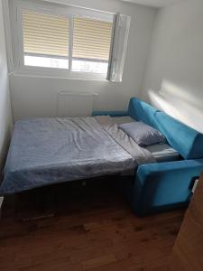 Postel nebo postele na pokoji v ubytování Belle chambre chez l'habitant calme au 4e étage sans ascenseur