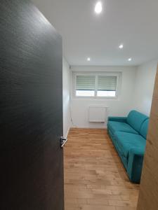 Posezení v ubytování Belle chambre chez l'habitant calme au 4e étage sans ascenseur