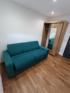 Posezení v ubytování Belle chambre chez l'habitant calme au 4e étage sans ascenseur