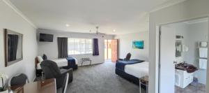 TV/trung tâm giải trí tại BK's Magnolia Motor Lodge