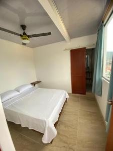 Giường trong phòng chung tại Rosablanca RN