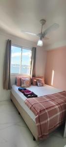 En eller flere senge i et værelse på Apê República Próx Metrô Centro Histórico