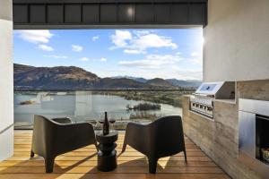 a kitchen with a table and chairs and a view at Northview Residence in Frankton