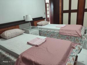 En eller flere senge i et værelse på Mirante da Gavião House