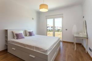 En eller flere senge i et værelse på Blue Heaven Luxury V5 + 55 billeder