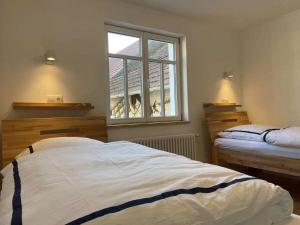 Ένα ή περισσότερα κρεβάτια σε δωμάτιο στο Holiday home 1820 Comfortable holiday residence