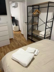 Postel nebo postele na pokoji v ubytování San Luis 26