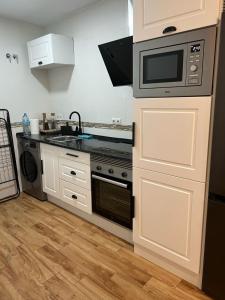 Kuchyň nebo kuchyňský kout v ubytování San Luis 26 + 3 fotografie