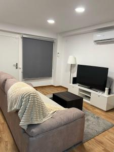 TV a/nebo společenská místnost v ubytování San Luis 26