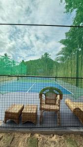 Piscina de la sau aproape de Inbox Siargao Resort