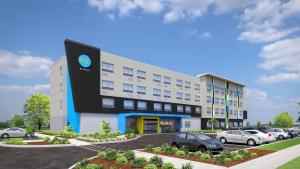 a rendering of a building with cars parked outside at Tru By Hilton Bellefonte in Bellefonte