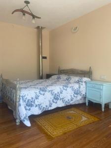 Ένα ή περισσότερα κρεβάτια σε δωμάτιο στο El Peregrino +17 φωτογραφίες