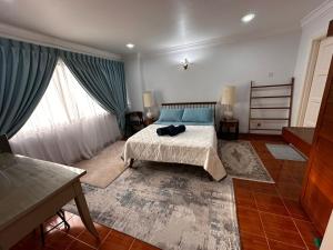 En eller flere senge i et værelse på AJ's Regency Tanjung Tuan Beach Resort, Port Dickson, Malaysia - Seafront apartments + 101 billeder