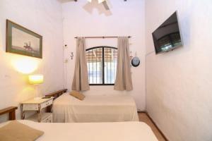 Postel nebo postele na pokoji v ubytování Casa con pileta Colastine III - Santa Fe