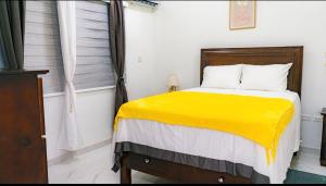 Postel nebo postele na pokoji v ubytování Apartment in Kingston at Sunnyshade