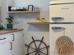 Kuchyň nebo kuchyňský kout v ubytování Nefeli Beach Home