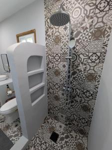 Et badeværelse på Cozy Shell-central island Oasis