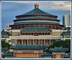 a large building with a dome on top of it at Hanting Hotel Chongqing Lianglukou Caiyuanba in Chongqing