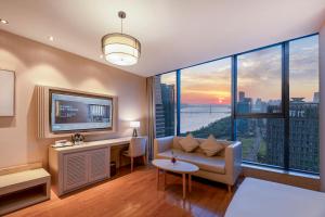 TV a/nebo společenská místnost v ubytování Crystal Orange Hotel (Hangzhou Binjiang Star Avenue)