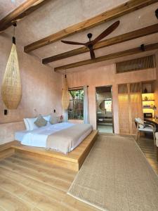 Ένα ή περισσότερα κρεβάτια σε δωμάτιο στο Lio Lio Suites