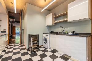 Una cocina o cocineta en Gulmohar527