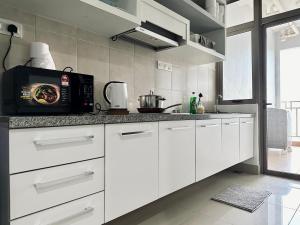 Кухня или мини-кухня в Shaftsbury Cyberjaya
