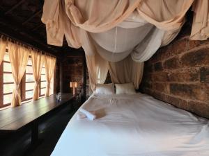 Postel nebo postele na pokoji v ubytování Tre Yoga Retreat + 42 fotografií