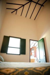 Кровать или кровати в номере Hotel Campestre Casa de la Abuela +47 фотографий