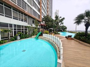 Πισίνα στο ή κοντά στο Stylish 3BR Skandinavia Tangcity Apt Max 12 Guests