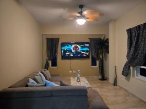 Et tv og/eller underholdning på Luxury Cabarete East Condominiums + 12 billeder