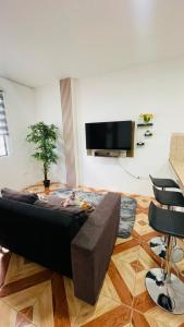 Μια τηλεόραση ή/και κέντρο ψυχαγωγίας στο Horizon House Piso 2 - Departamento