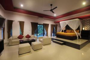 Ένα ή περισσότερα κρεβάτια σε δωμάτιο στο Tri Datu Palace +36 φωτογραφίες