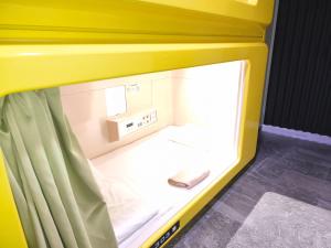 Postel nebo postele na pokoji v ubytování Hotel Shin-Imamiya + 121 fotografií