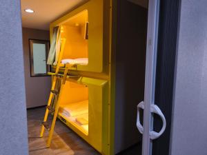 Postel nebo postele na pokoji v ubytování Hotel Shin-Imamiya