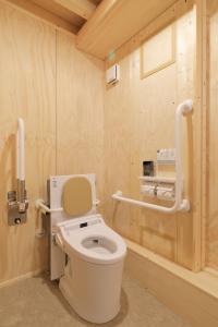 a bathroom with a white toilet in a room at SMA MO inn Chitose in Chitose +18 photos