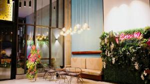 Posezení v ubytování Em Oi Boutique Hotel