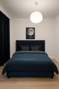 En eller flere senge i et værelse på Brussels City Fresh Oasis