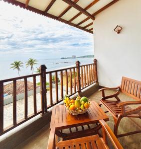 Un balcón o terraza en Rock Fort Beach Resort