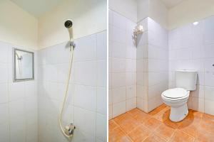 Koupelna v ubytování OYO 95064 Gunung Putri Skyland + 39 fotografií